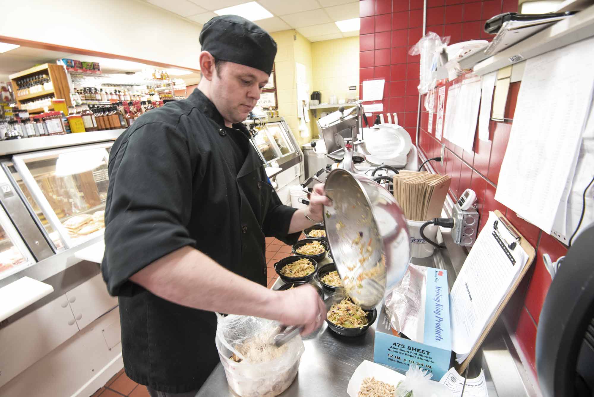 Chef Alan, working in the deli making delicious foood